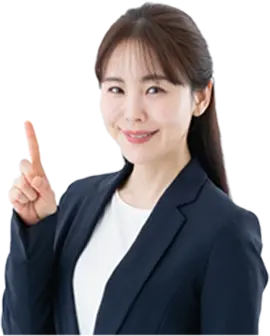 人差し指を立てる女性