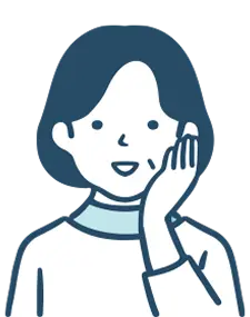 頬に手を当て微笑む女性